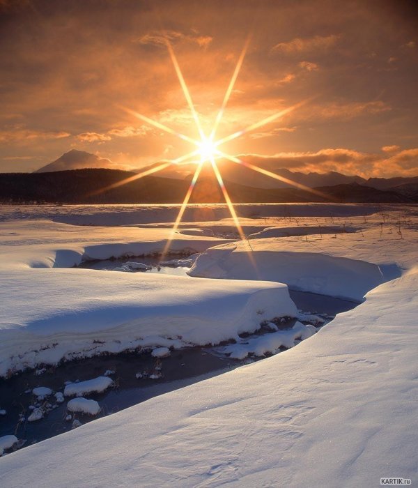 солнце снег
