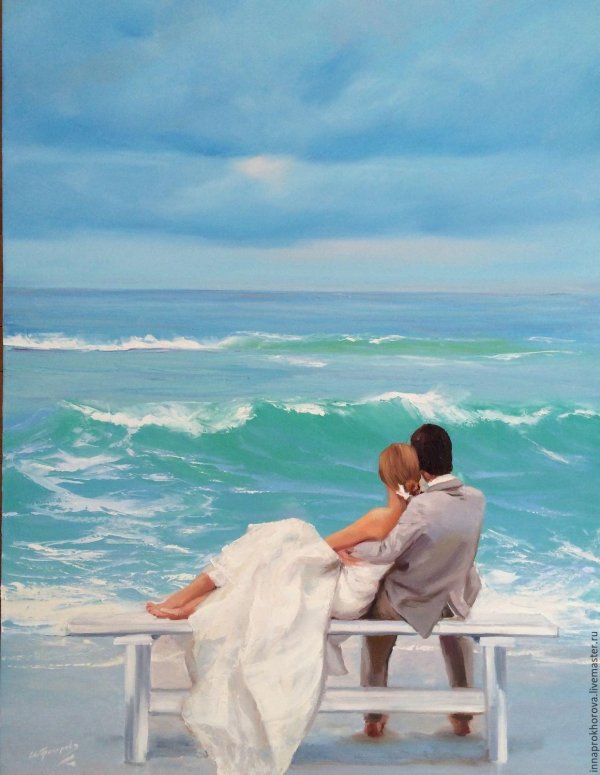 Девушка и парень на берегу моря