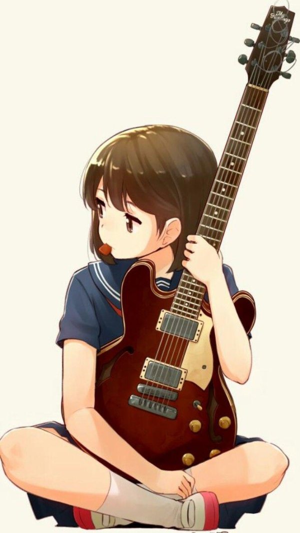 Девушка играет на гитаре