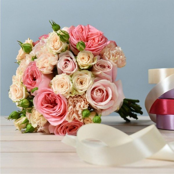 букет невесты из мелких розочек