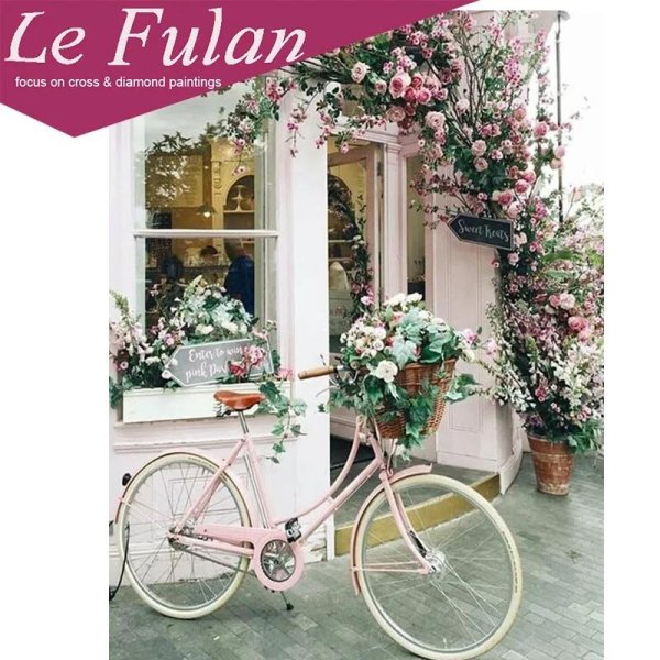 розовый велосипед