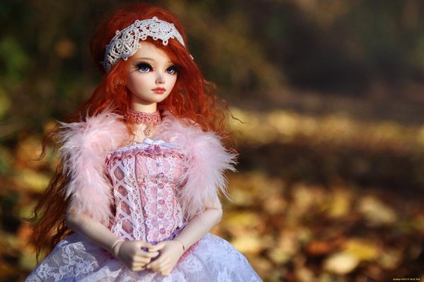 рыжая кукла